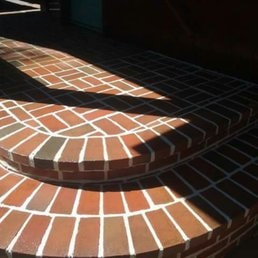 Curved Brick Steps — Curved brick entry steps with sunlit finish.