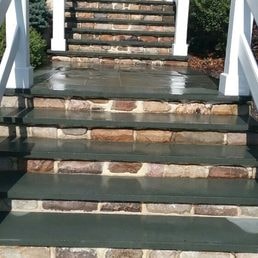 Brick Steps & Railings — Brick steps with green metal railings.
